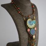 Кулон с керамическим амонитом