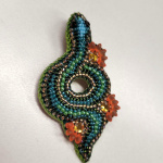 Брошь Змея в цветах айвы