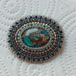 Брошь Мунку-Сардык