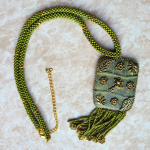 Кулон кожаный