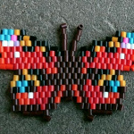 Павлиний глаз сплетённый из термомозаики